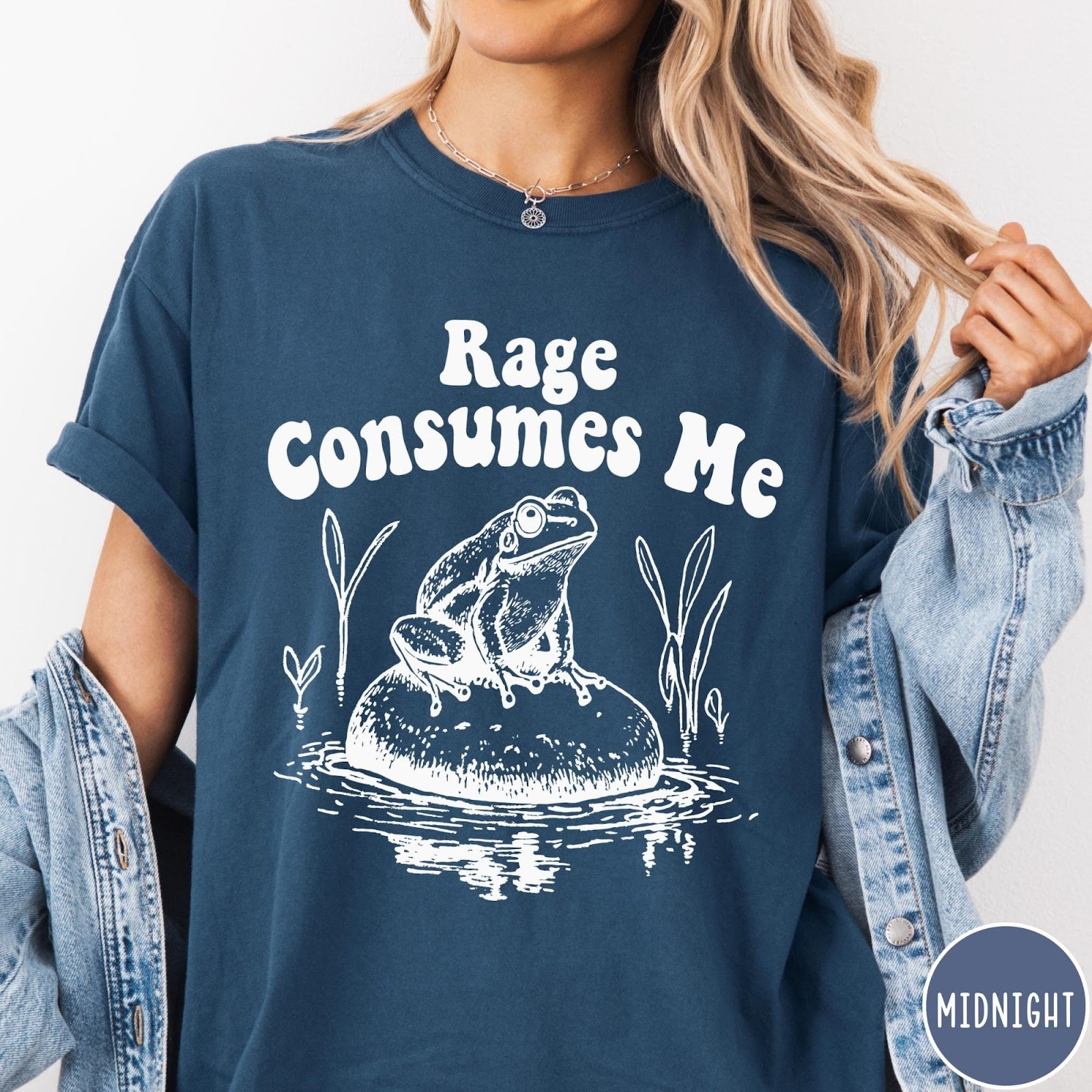 Comfort Colors tee in Midnight featuring retro style graphic of a frog sitting on a rock