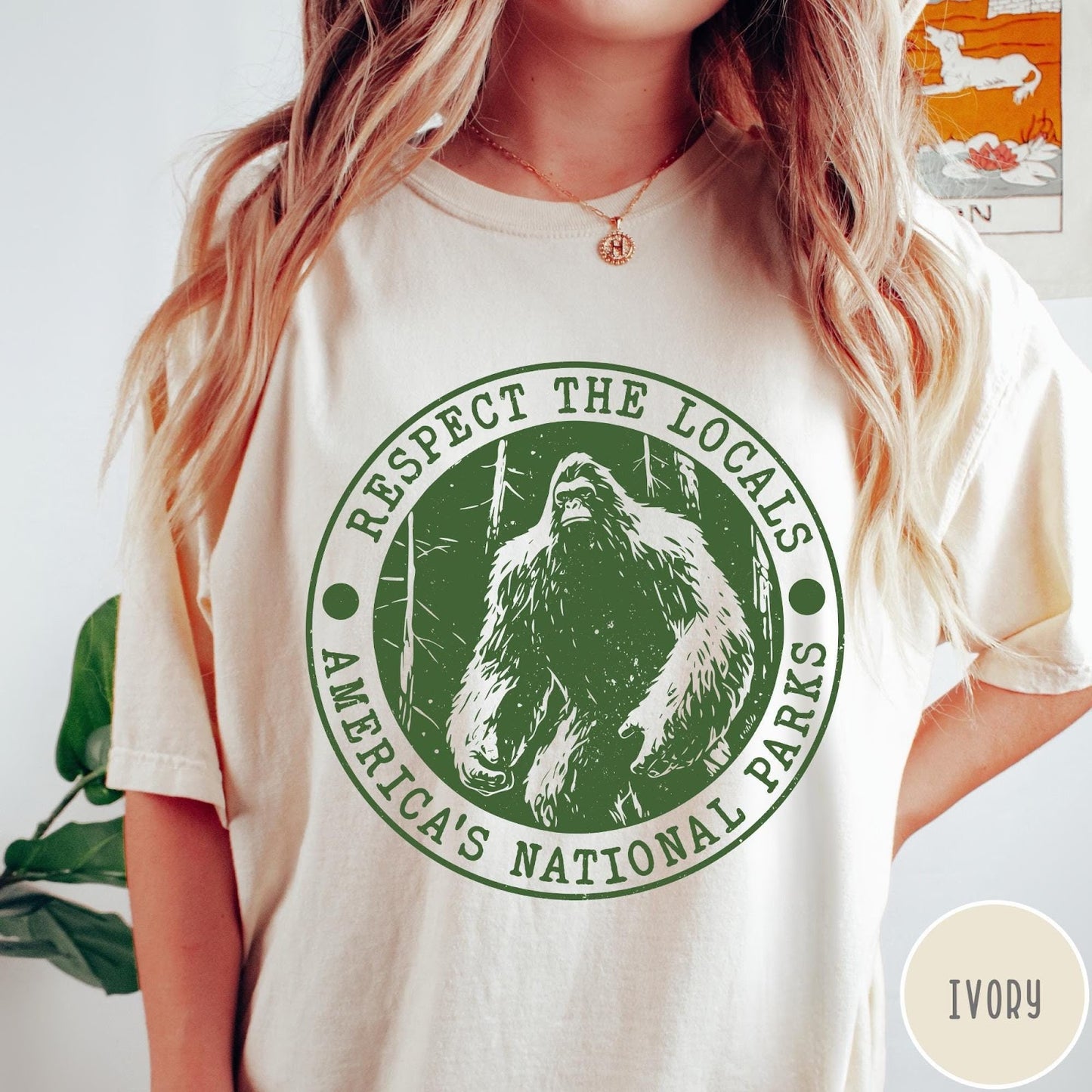Comfort Colors tee in Ivory featuring circular graphic design with Bigfoot and Respect the Locals text