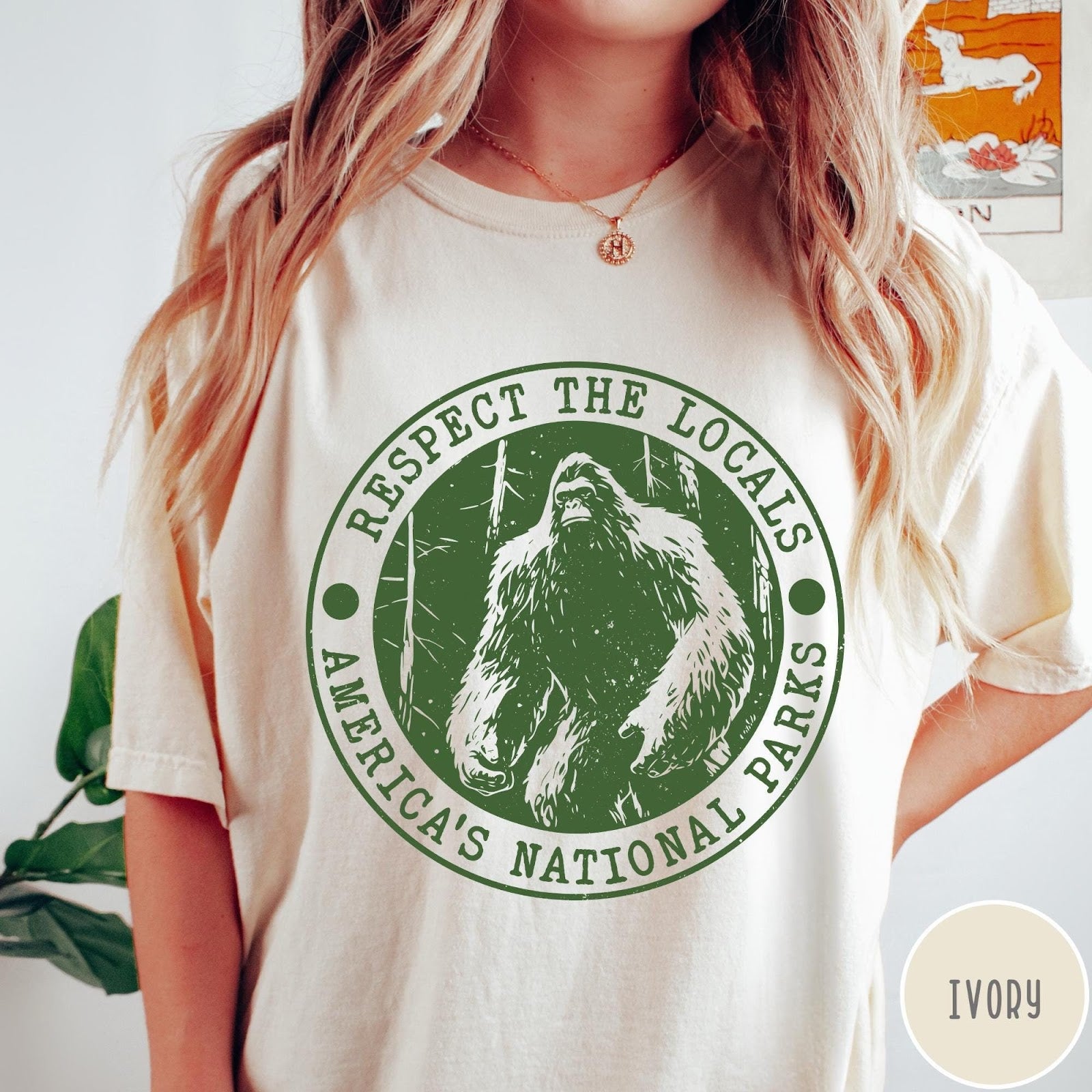 Comfort Colors tee in Ivory featuring circular graphic design with Bigfoot and Respect the Locals text