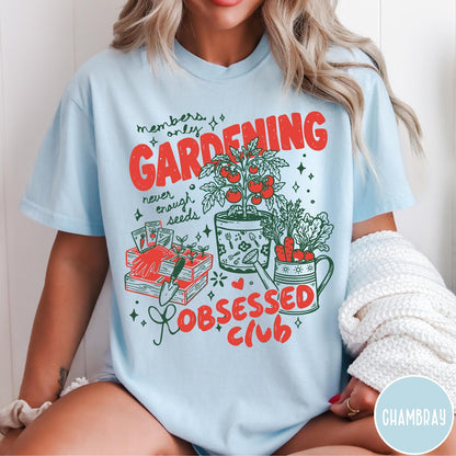 Comfort Colors tee in Chambray featuring retro graphic gardening design with tomato plant, seeds, and gardening tools