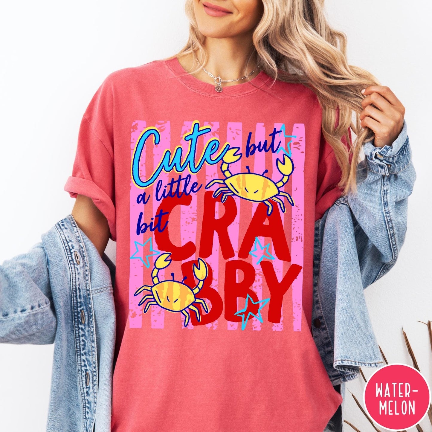 Comfort Colors tee in Watermelon featuring playful graphic text and yellow crab illustrations with pink stripes