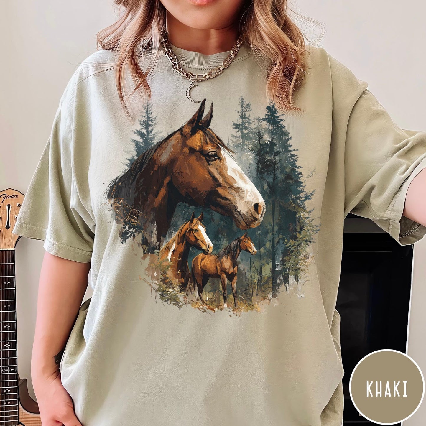 Comfort Colors tee in Khaki featuring vintage style graphic of three horses standing in a pine forest