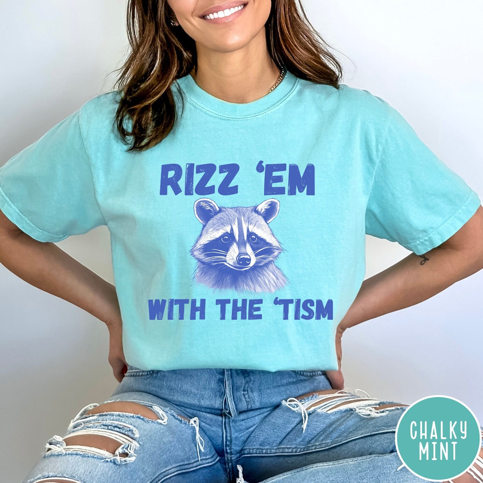 Comfort Colors tee in Chalky Mint featuring screen printed raccoon graphic and Rizz Em With the Tism text