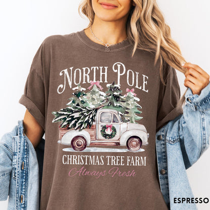Comfort Colors tee in Espresso featuring vintage style Christmas tree farm truck graphic with snowy pine trees