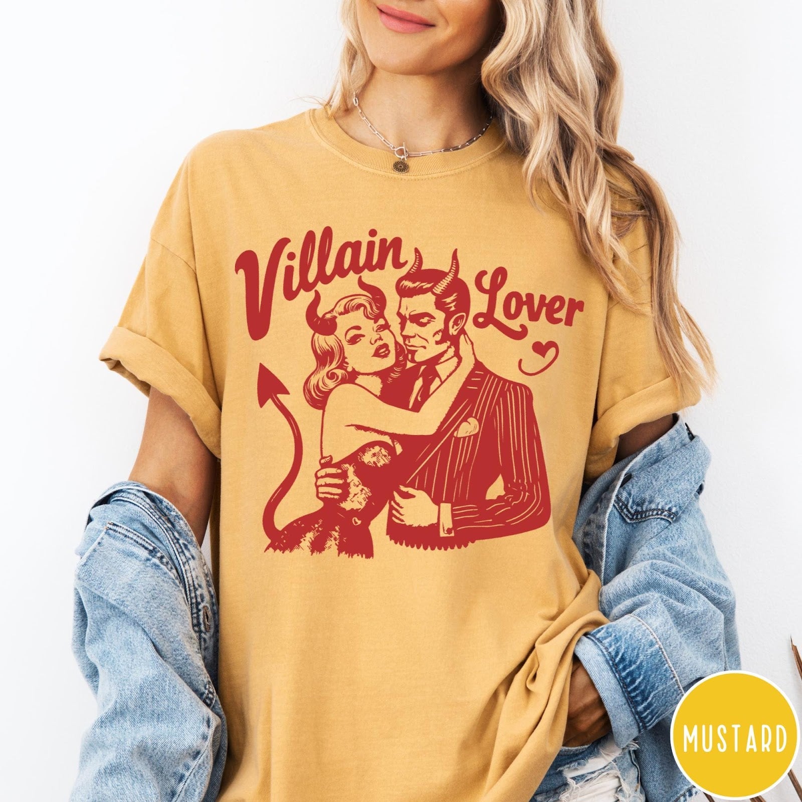 Comfort Colors tee in Mustard featuring vintage style graphic of a devilish couple embracing each other