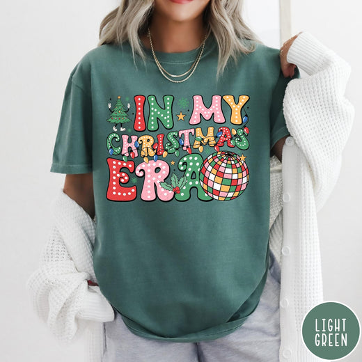 Comfort Colors tee in Light Green featuring Christmas disco style graphic with festive tree and colorful disco ball