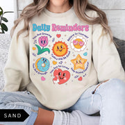 Comfort Colors tee in Sand featuring retro mascot design with daily affirmations and colorful graphics