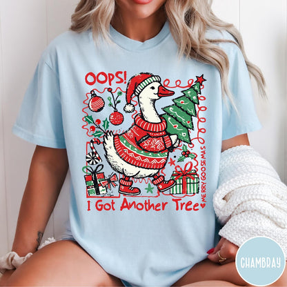 Comfort Colors tee in Chambray featuring festive graphic design of a goose wearing a sweater and hat