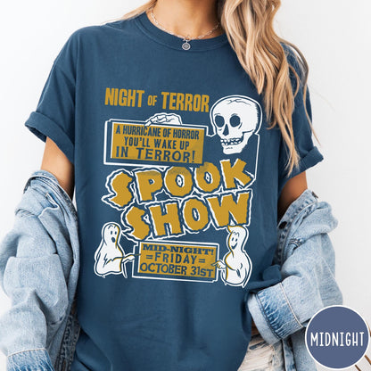 Comfort Colors tee in Midnight featuring retro horror movie poster graphic with skull and spooky ghost illustrations
