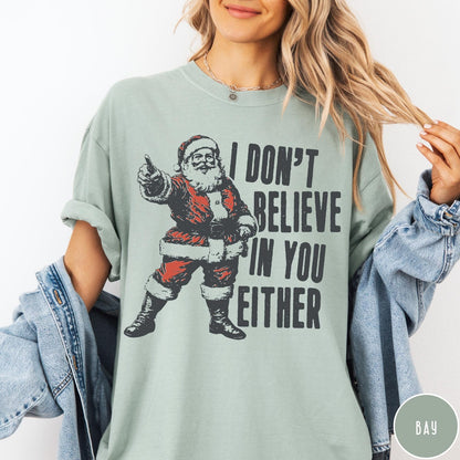 Comfort Colors tee in Bay featuring vintage style Santa Claus graphic with text I Don't Believe In You