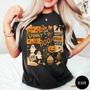 Comfort Colors tee in Black featuring Halloween collage design with pumpkins, ghosts, and festive autumn graphics