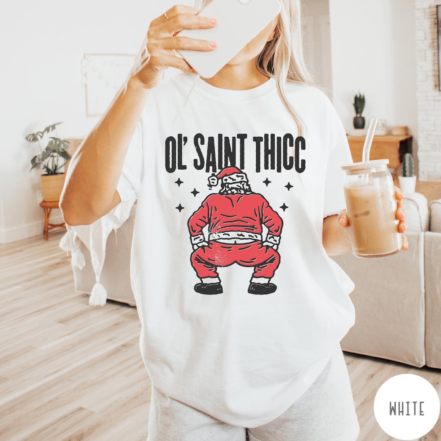 Comfort Colors tee in White featuring festive graphic style Santa Claus doing a dance move with stars