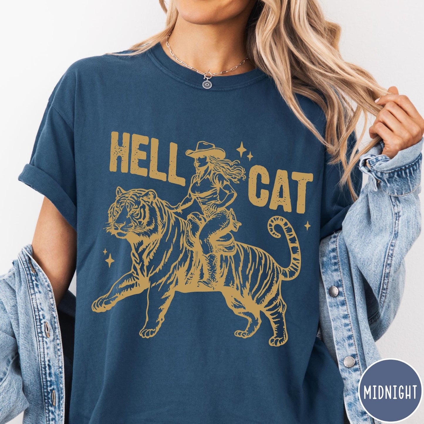Comfort Colors tee in Midnight featuring western style graphic of a cowgirl riding a large tiger