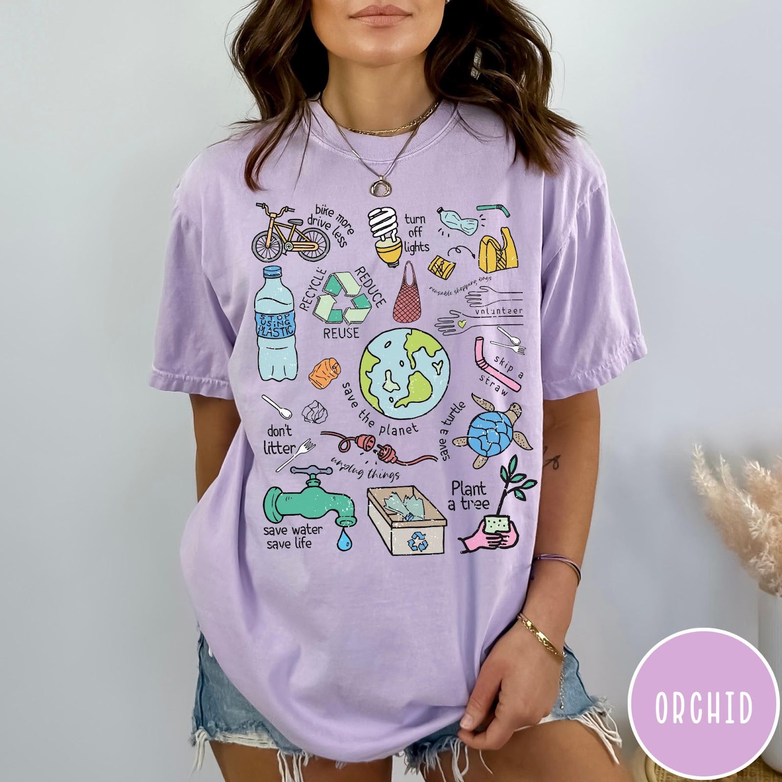 Comfort Colors tee in Orchid featuring environmental awareness graphic with icons for recycling, saving water, and nature.