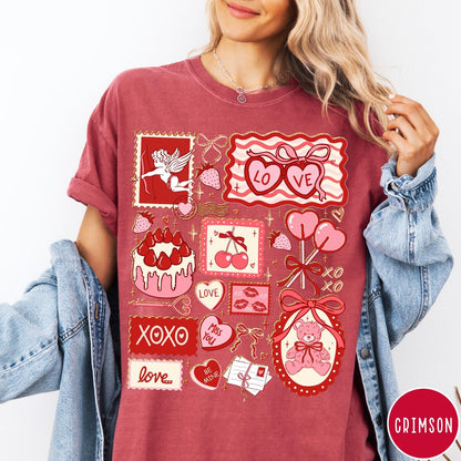 Comfort Colors tee in Crimson featuring vintage collage design with cupid, teddy bear, and Valentine's Day icons