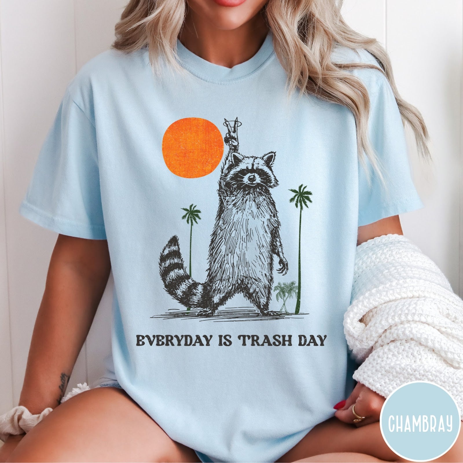 Comfort Colors tee in Chambray featuring vintage style graphic of a raccoon making a peace sign