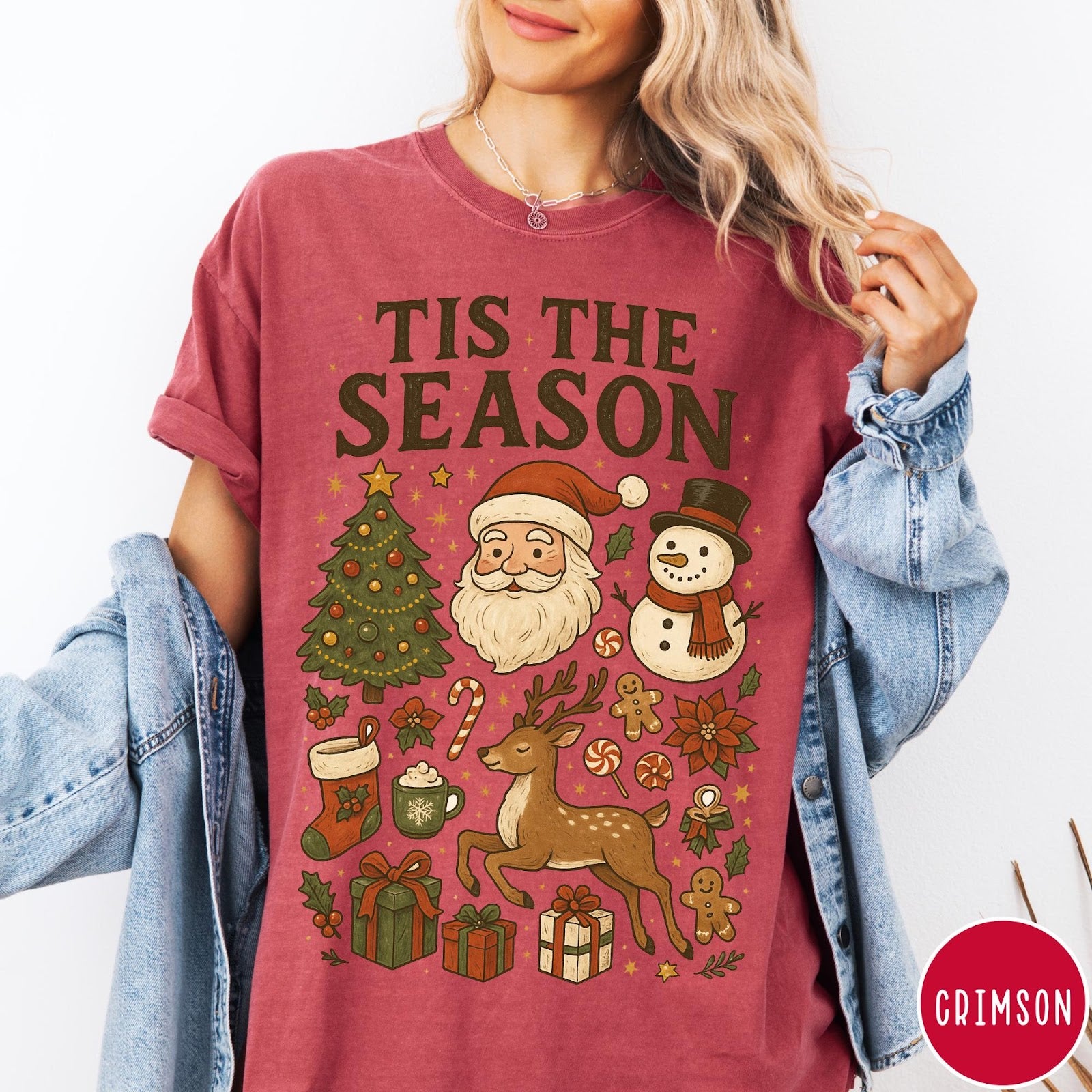 Comfort Colors tee in Crimson featuring Christmas collage graphic with Santa, snowman, reindeer, and holiday gifts