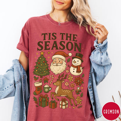 Comfort Colors tee in Crimson featuring Christmas collage graphic with Santa, snowman, reindeer, and holiday gifts