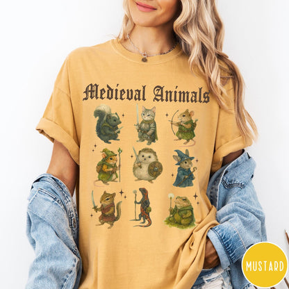 Comfort Colors tee in Mustard featuring medieval animals graphic with fantasy characters including a cat, hedgehog, and frog