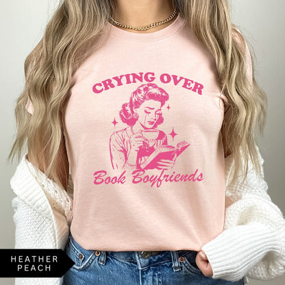 Comfort Colors tee in Heather Peach featuring retro style graphic of a woman crying while reading a book