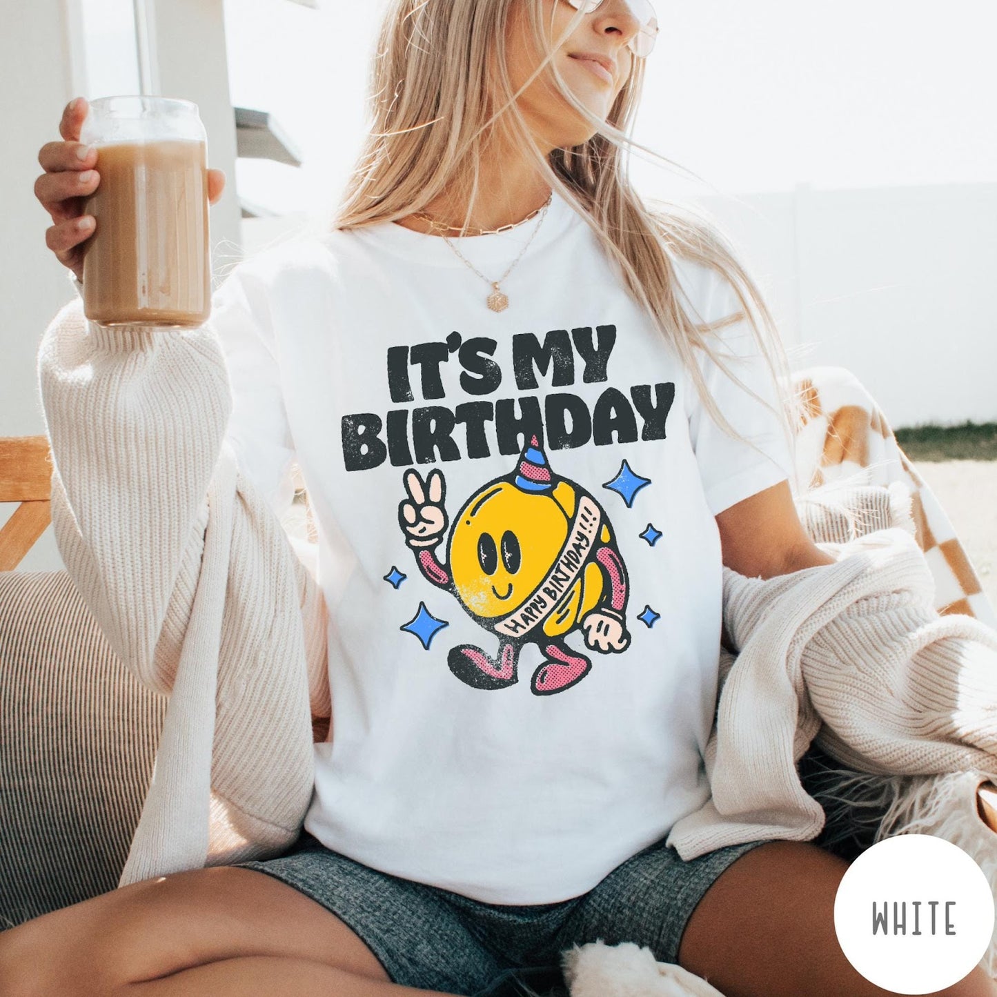 Comfort Colors tee in White featuring retro birthday mascot graphic with peace sign and party hat