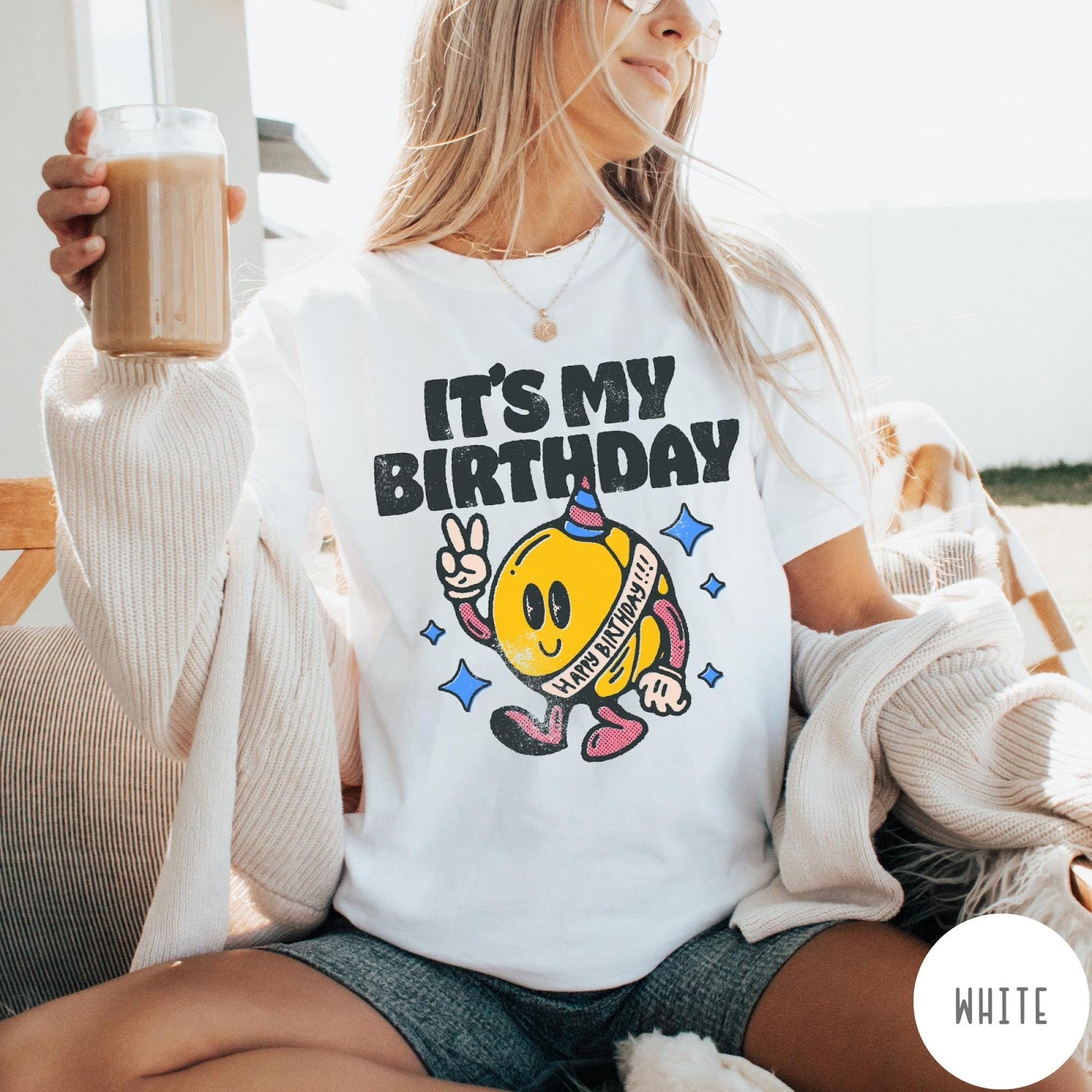 Comfort Colors tee in White featuring retro birthday mascot graphic with peace sign and party hat