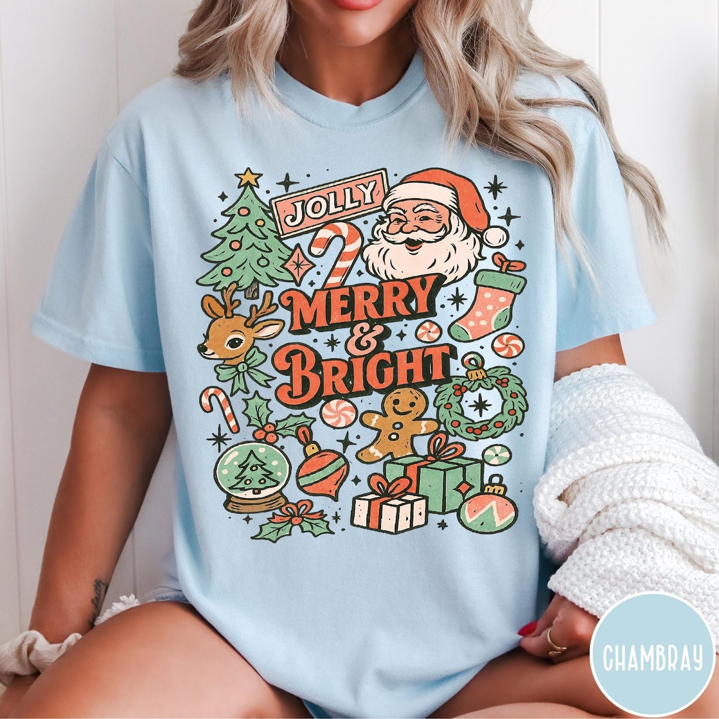 Comfort Colors tee in Chambray featuring retro holiday style graphic with Santa, reindeer, and Christmas icons