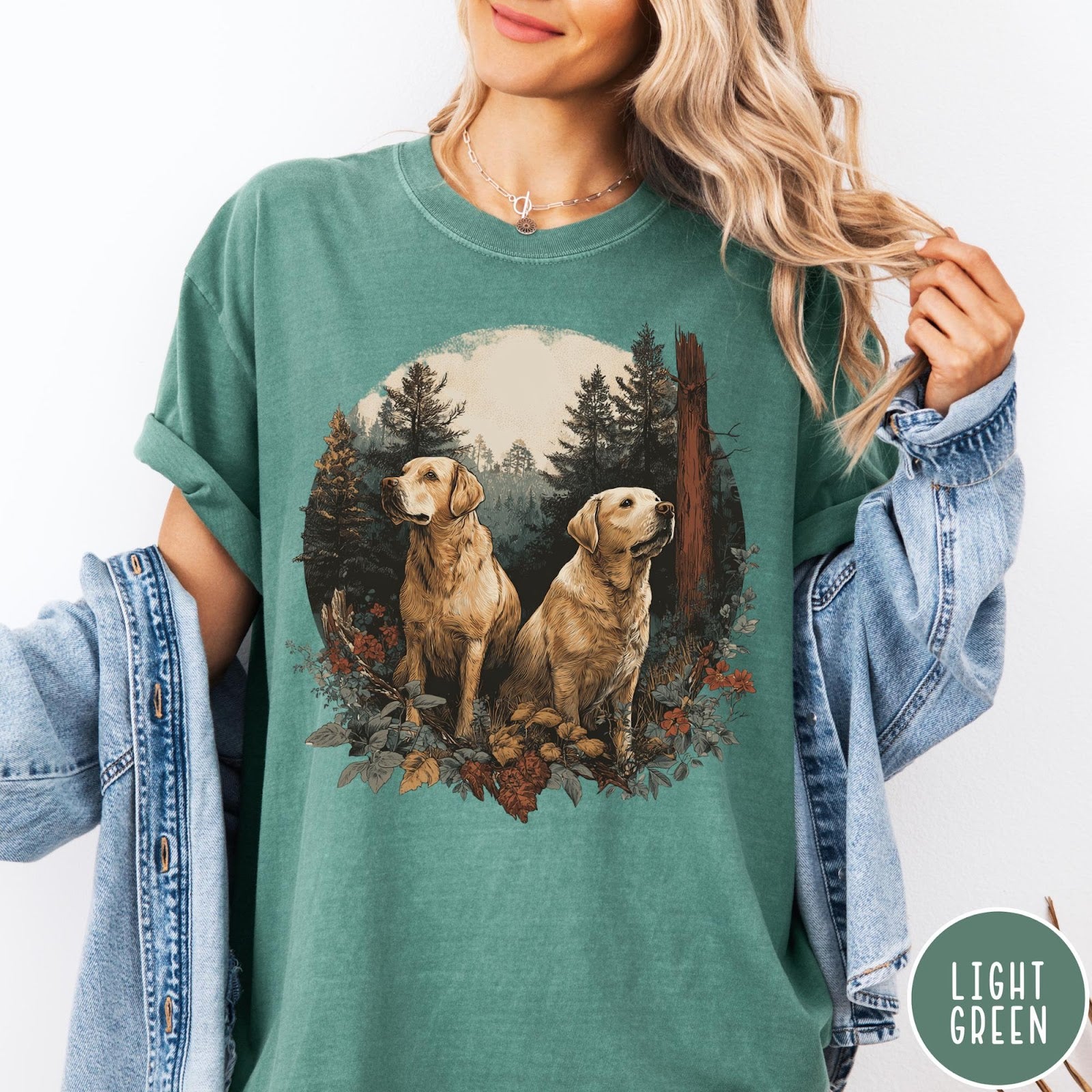 Comfort Colors tee in Light Green featuring vintage style graphic of two golden labrador dogs in a forest