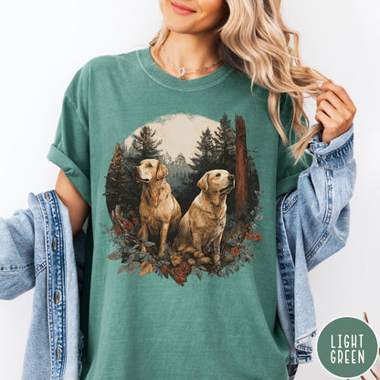 Comfort Colors tee in Light Green featuring vintage style graphic of two golden labrador dogs in a forest