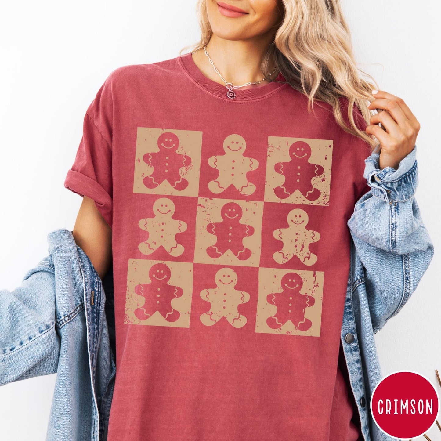 Comfort Colors tee in Crimson featuring a grid design with nine distressed gingerbread man cookie graphic prints