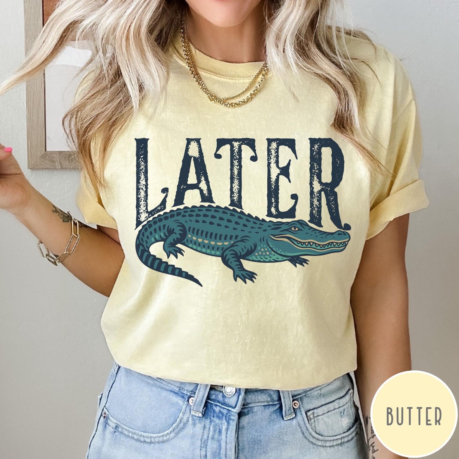 Comfort Colors tee in Butter featuring casual style with a graphic of a green alligator and text