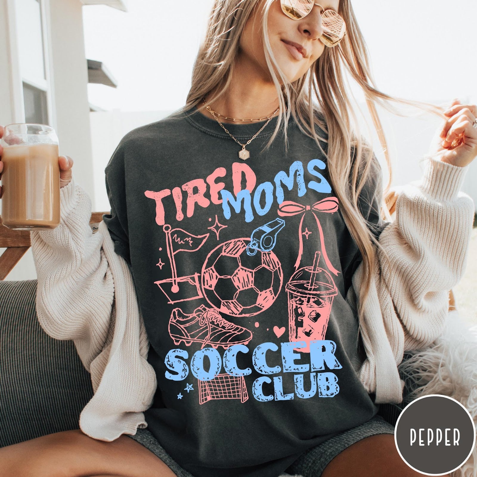 Comfort Colors tee in Pepper featuring soccer mom life graphic with soccer ball and iced coffee