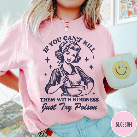 Comfort Colors tee in Blossom featuring retro housewife design with a woman whisking a bowl and text