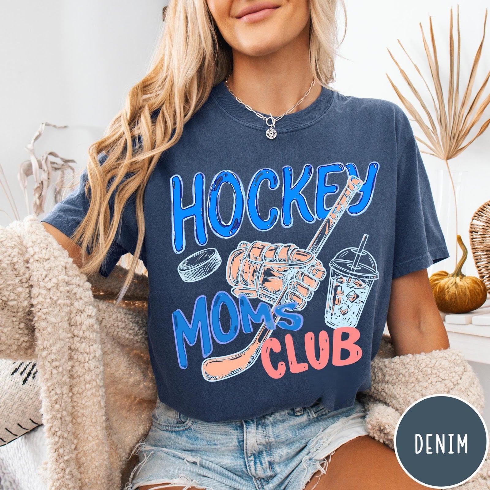 Comfort Colors tee in Denim featuring lifestyle graphic design with hockey glove, stick, puck, and iced coffee