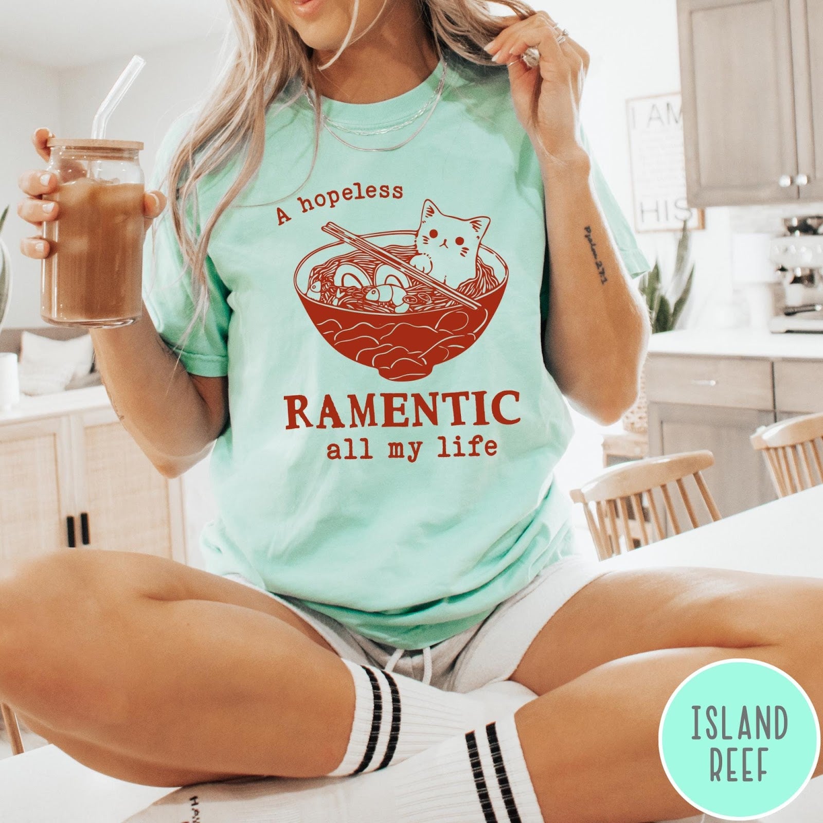 Comfort Colors tee in Island Reef featuring line art graphic of a cute cat inside a ramen bowl