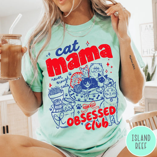 Comfort Colors tee in Island Reef featuring retro style graphic with cats, yarn, and cat mama club text