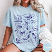 Comfort Colors tee in Chambray featuring vintage bird tattoo style graphic with various birds and flowers