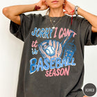 Comfort Colors tee in Pepper featuring baseball style graphic with glove, ball, bat, and iced coffee drink