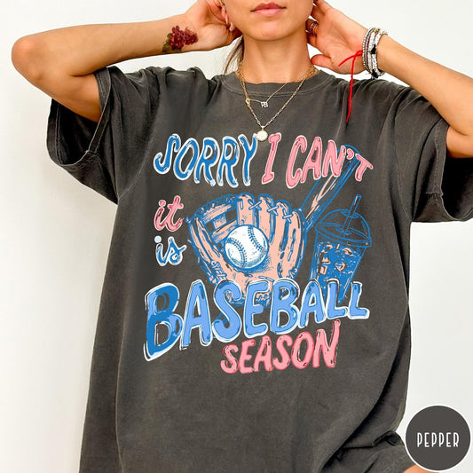 Comfort Colors tee in Pepper featuring baseball style graphic with glove, ball, bat, and iced coffee drink
