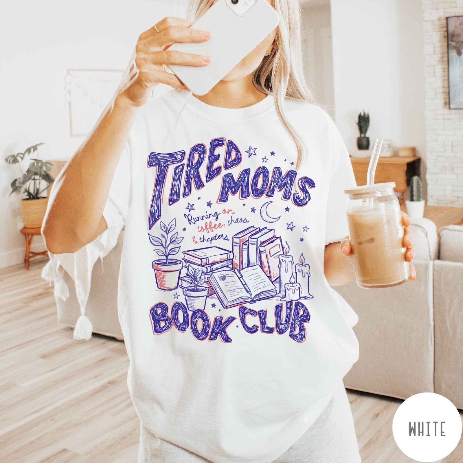 Comfort Colors tee in White featuring illustrated book club graphic with plants, candles, and reading text