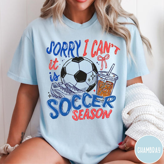 Comfort Colors tee in Chambray featuring screen print style soccer season graphic with ball and iced coffee