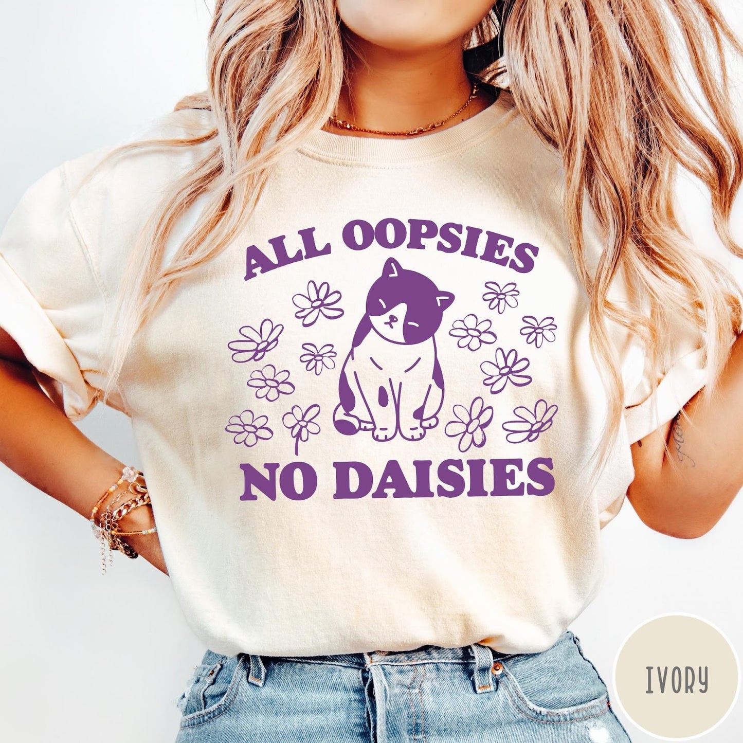 Comfort Colors tee in Ivory featuring cute cat graphic with purple text reading All Oopsies No Daisies
