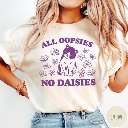 Comfort Colors tee in Ivory featuring cute cat graphic with purple text reading All Oopsies No Daisies