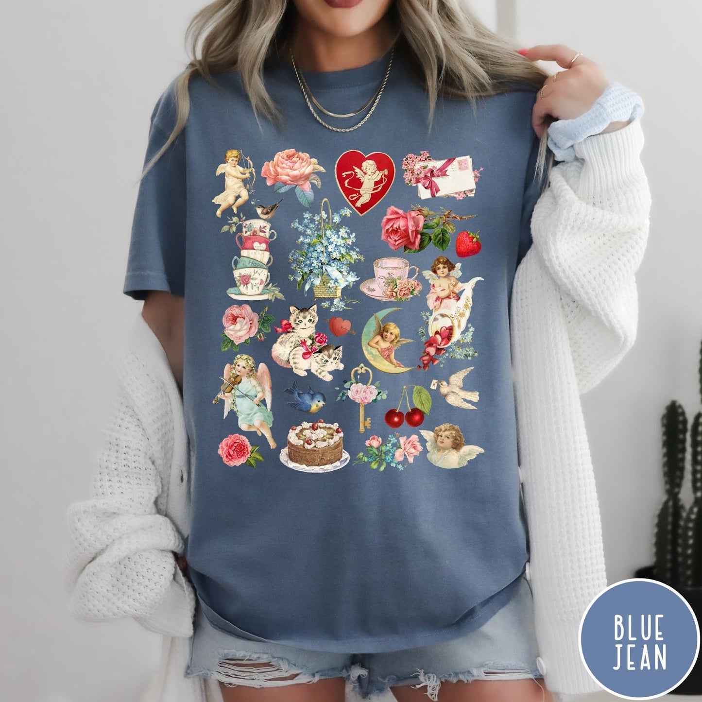 Comfort Colors tee in Blue Jean featuring vintage Valentine collage graphic with cherubs, flowers, cats, and romantic symbols