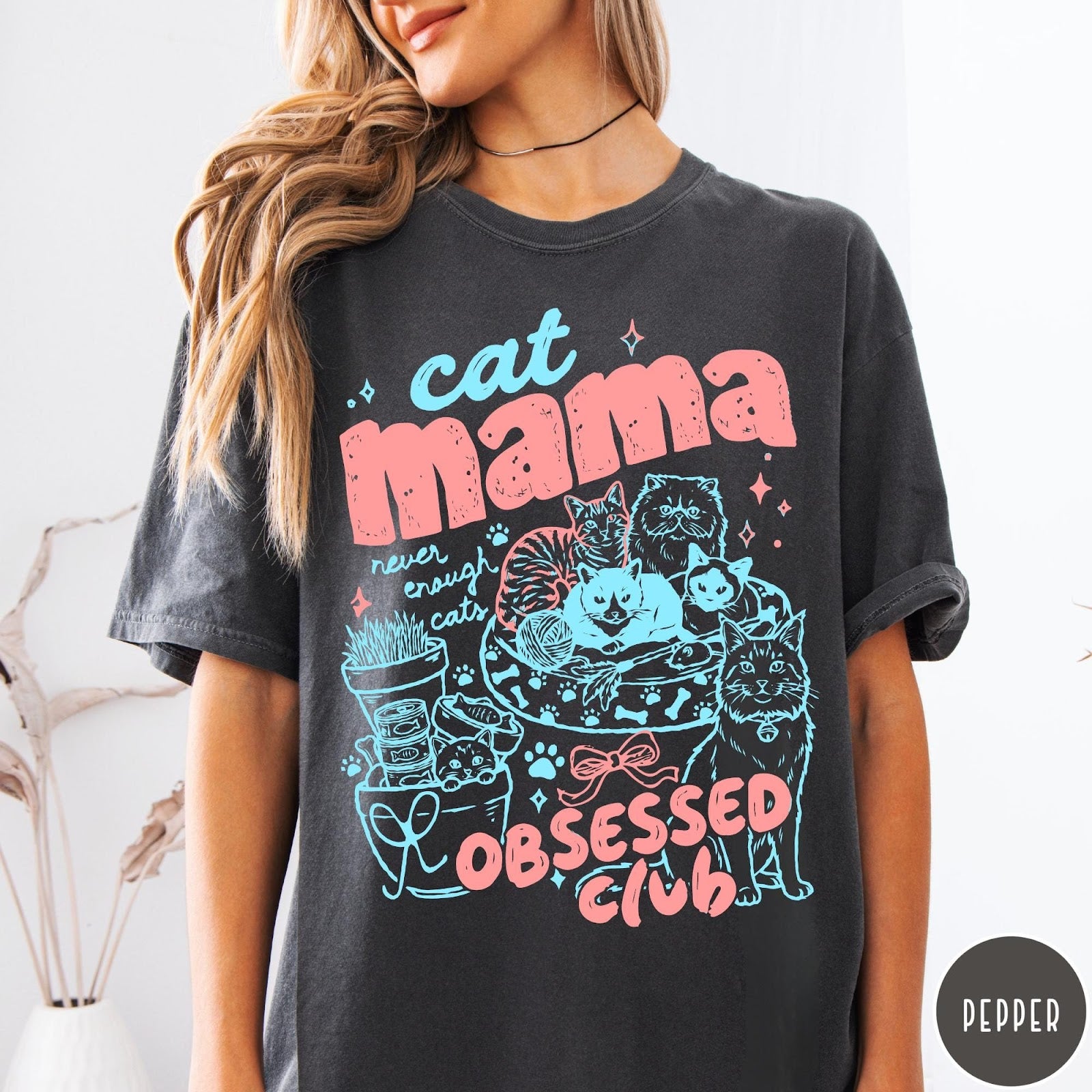 Comfort Colors tee in Pepper featuring cat mama club graphic with multiple cats and pink blue ink