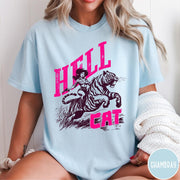 Comfort Colors tee in Chambray featuring retro design of a cowgirl riding a tiger with pink text