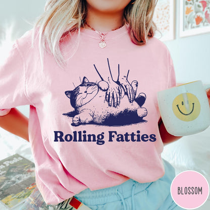 Comfort Colors tee in Blossom featuring illustration style graphic of a chubby cat getting a belly rub