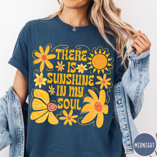 Comfort Colors tee in Midnight featuring inspirational quote design with yellow flowers and a sun graphic