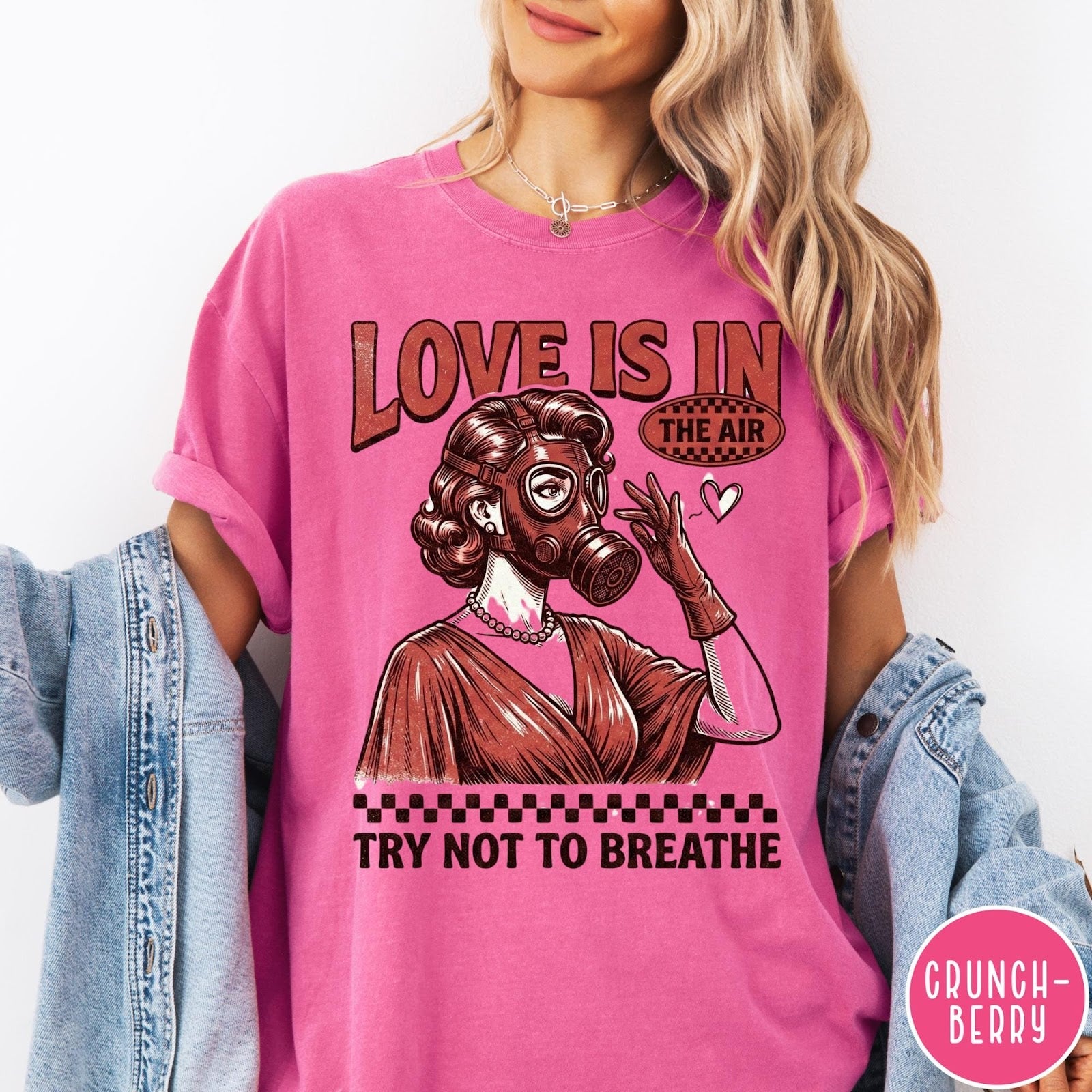 Comfort Colors tee in Crunchberry featuring retro style graphic of a woman wearing a gas mask