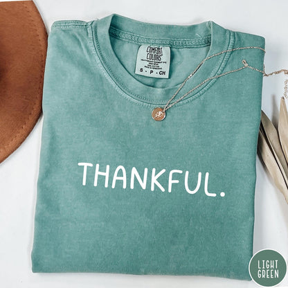 Comfort Colors tee in Light Green featuring minimalist style with the word Thankful printed in white text